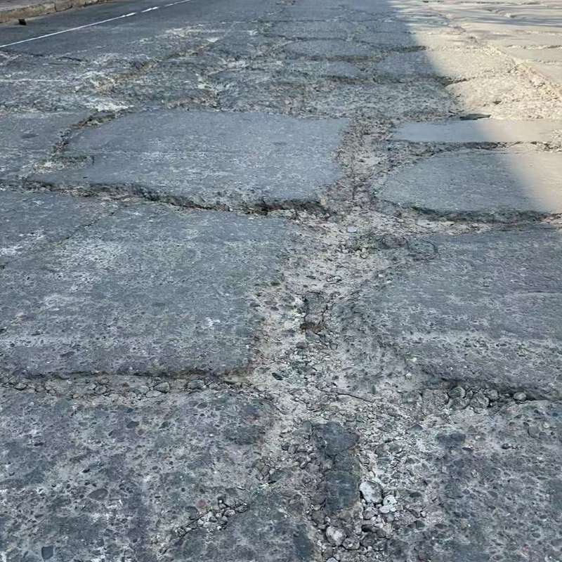 镇康路面起砂露石子修补料